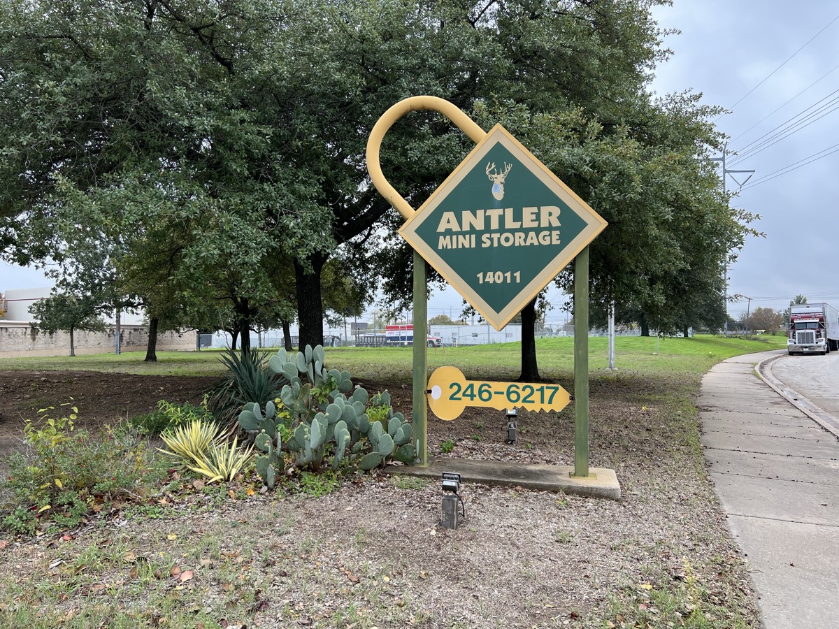 Antler Mini Storage sign at the Thomas Sinclair location showing address 14011 and phone number 246-6217